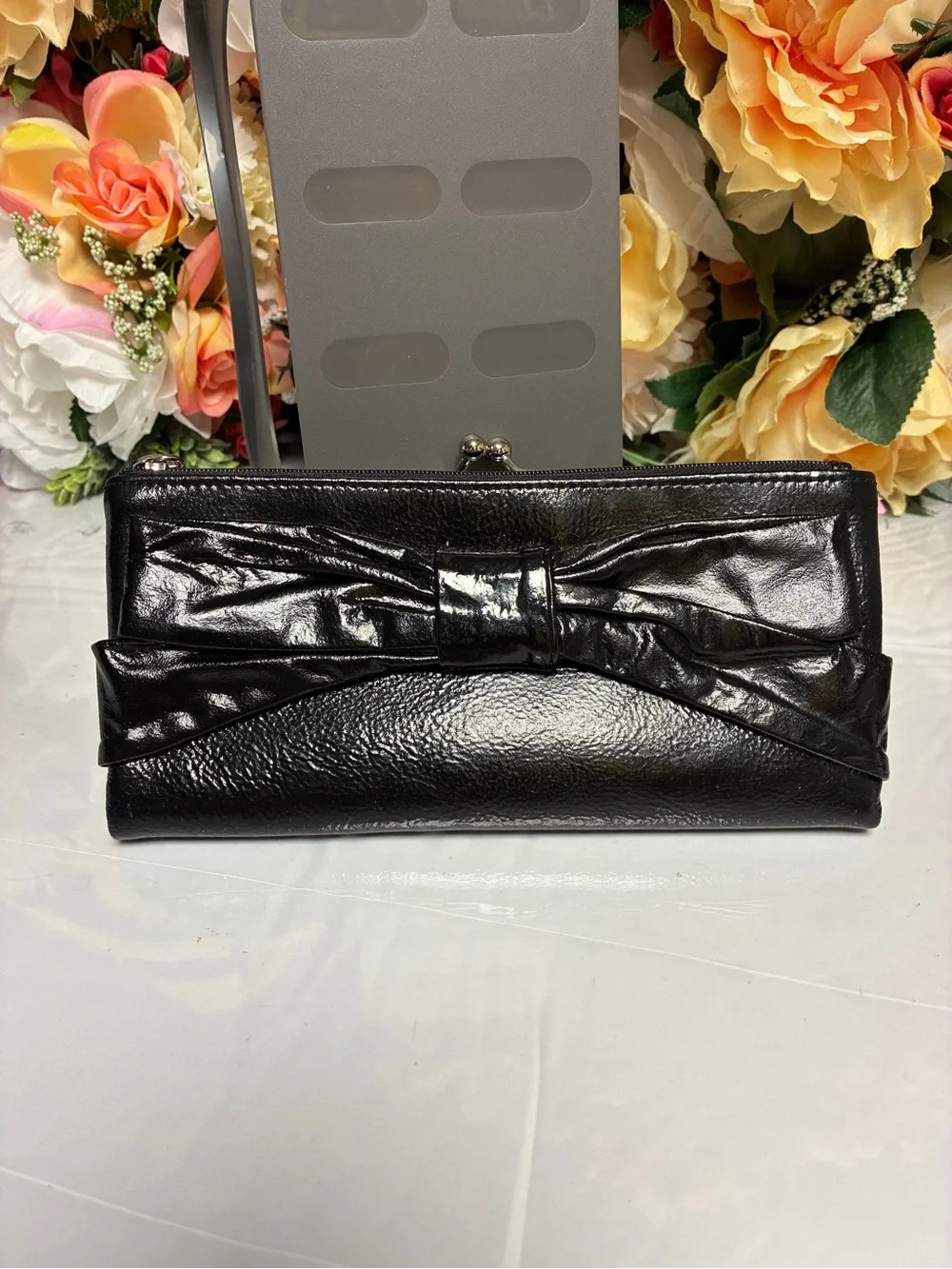 HOBO International Black Patent Finish Bow Kiss Lock Continental Wallet Clutch